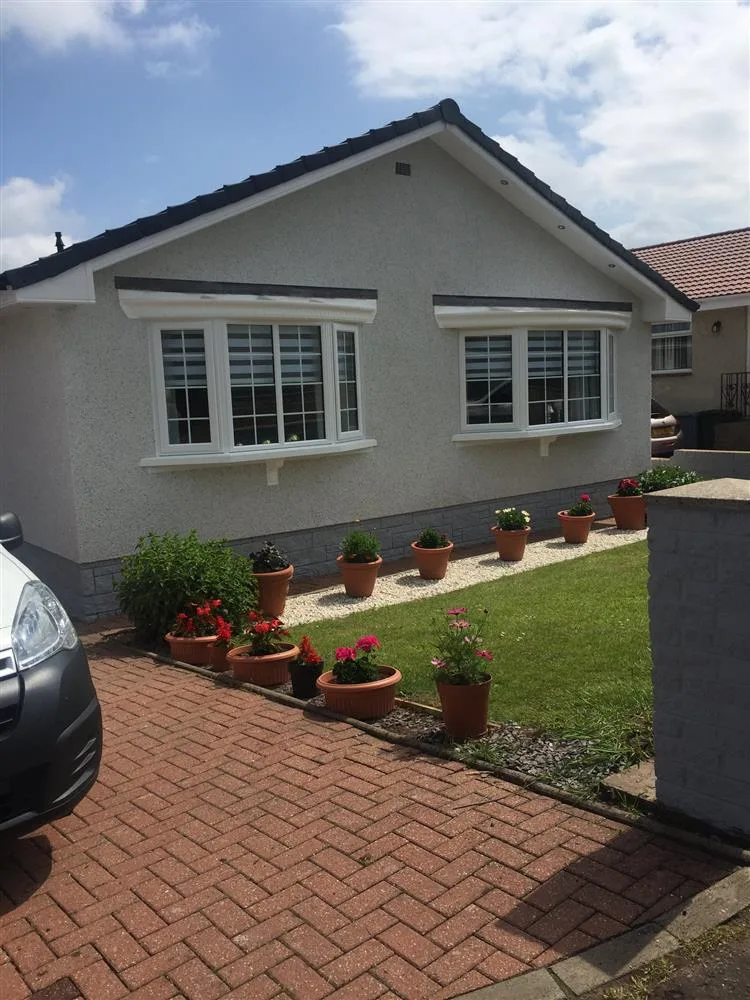 Bay and bow windows on a bungalow exterior in Glasgow