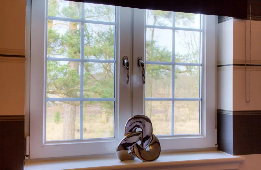 Casement window with handles, interior view in a Glasgow home