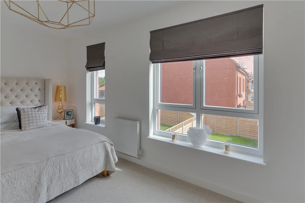 White uPVC window in a Glasgow bedroom, interior view